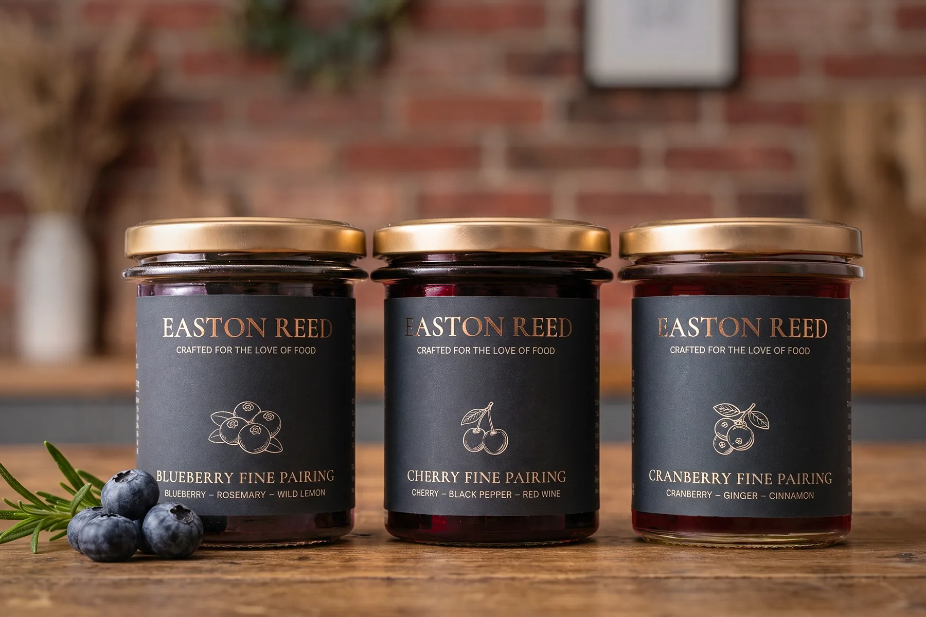Autumn table with Easton Reed Cranberry Maple Syrup, three sauces and three Fine Pairings jars, with cheese, grapes and pancakes